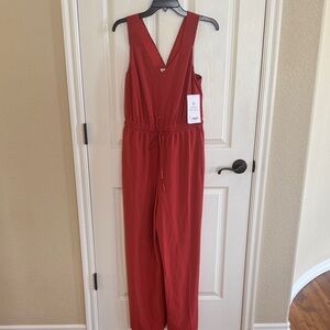 NWT Athleta Savannah Jumpsuit size 2. Relaxed fit cinnamon color. Drawstring.